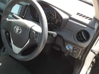 Toyota Axio EX 2021 (Hybrid, Auction Grade 4) – Silver | 80,000 km | Port | STK-260494